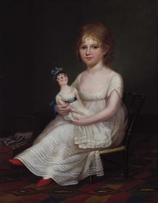 A Girl Holding a Doll