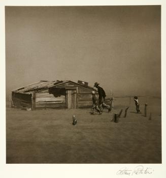 Farmer and sons walking in the face of a dust storm. Cimarron County, Oklahoma April 1936