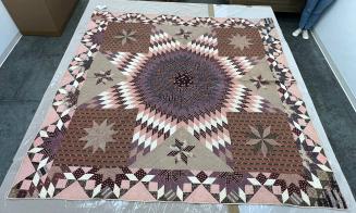 Star of Bethlehem and satellite stars pattern pieced quilt
