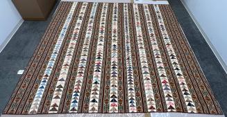 American or English flying geese quilt