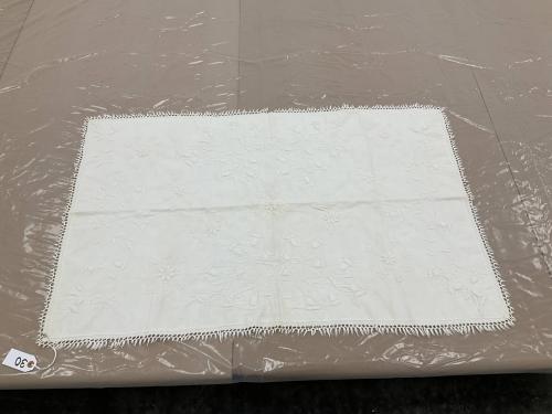 Whitework dressing table quilt