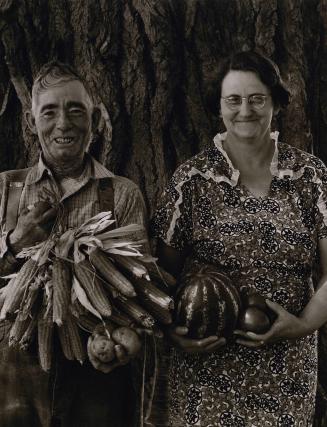 Mr. and Mrs. Andy Bahain. FSA borrowers on their farm near Kersey, Colorado October 1939